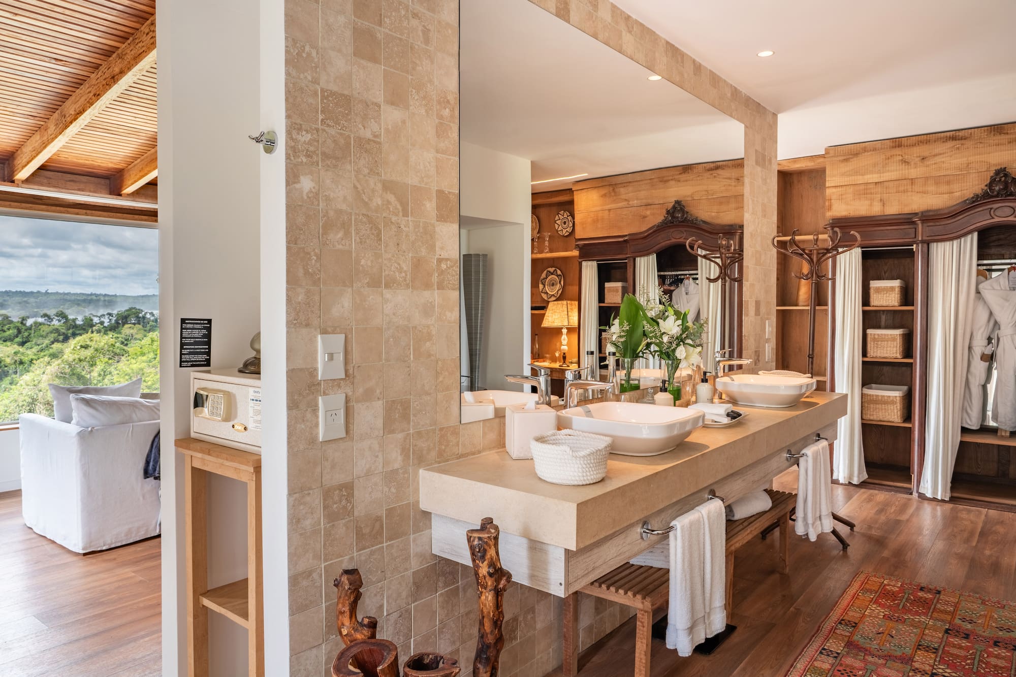 a bathroom with a large mirror and sinks