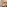 Hotel bathroom double vanity, natural wood, stone tiles, jungle view.
