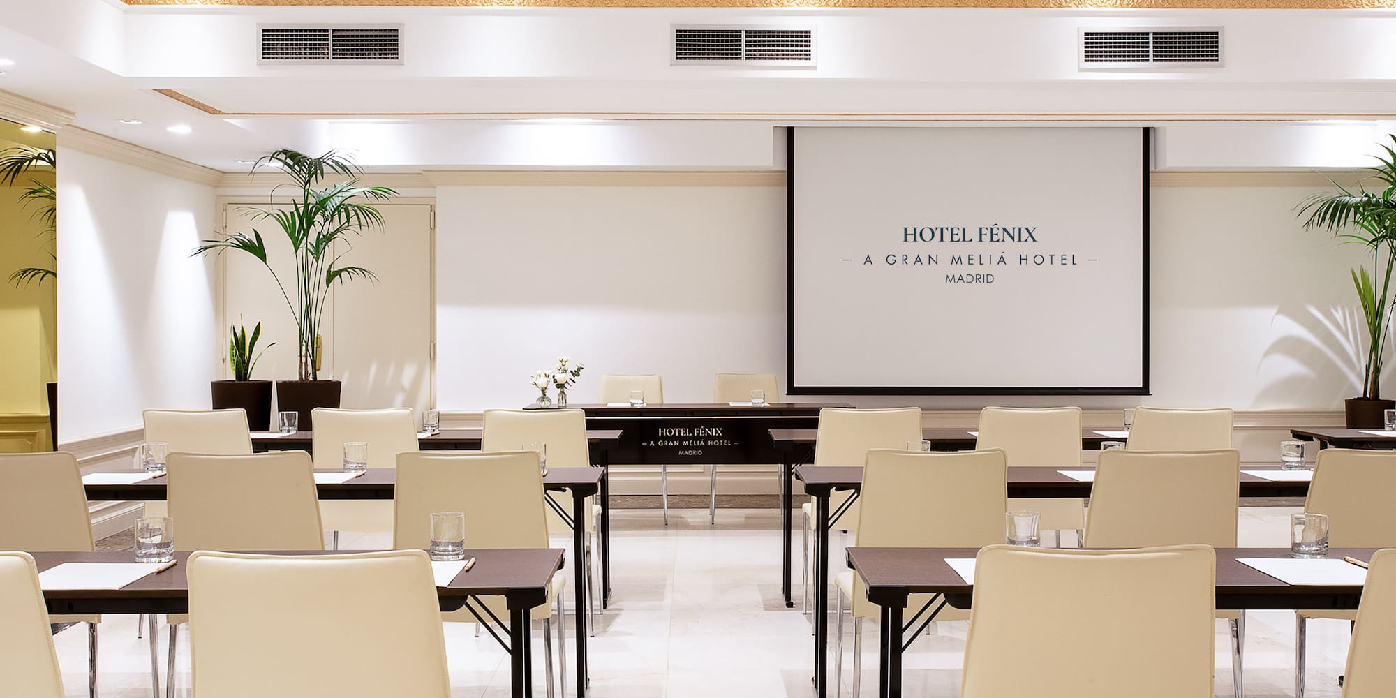 a room with tables and chairs