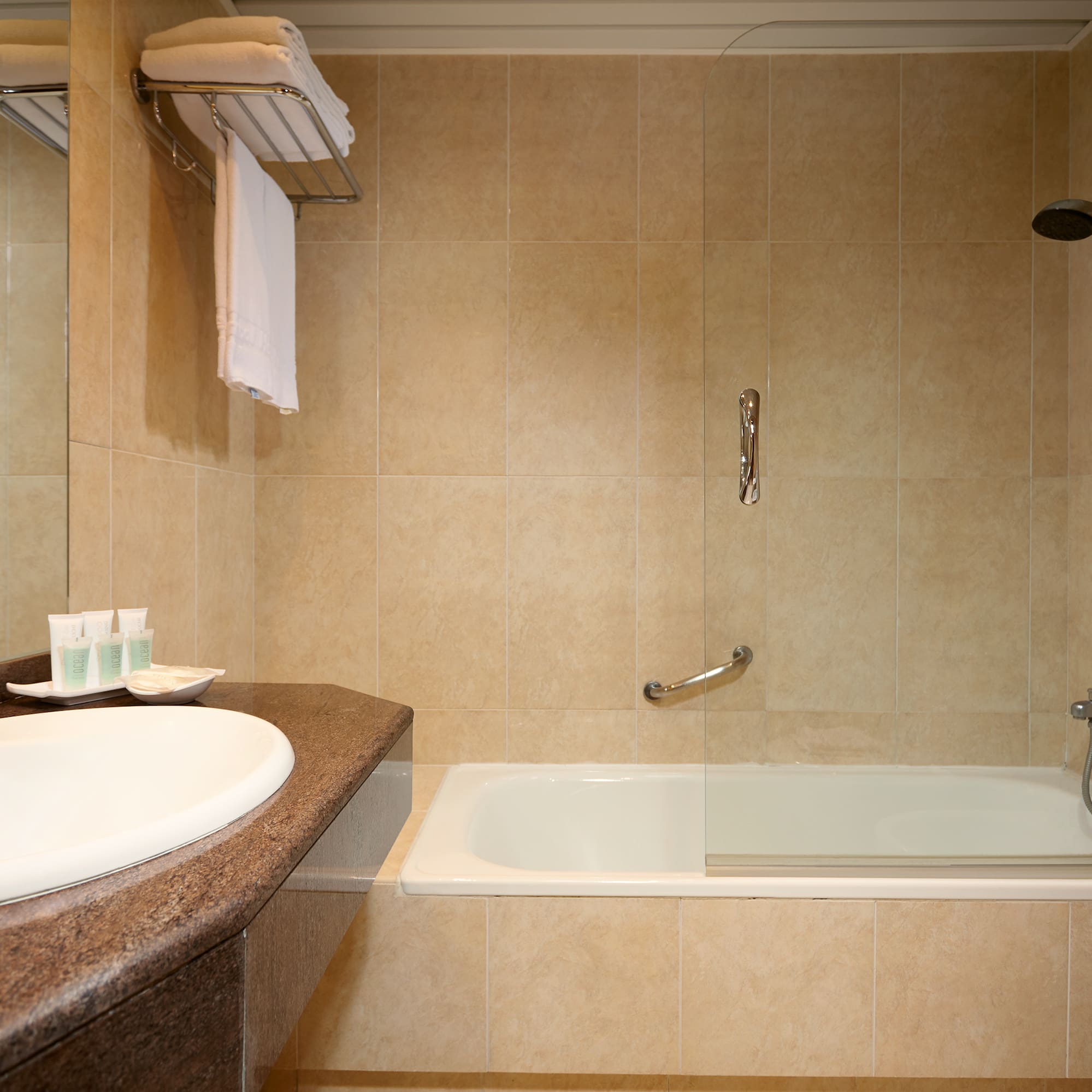 a bathroom with a bathtub and a sink