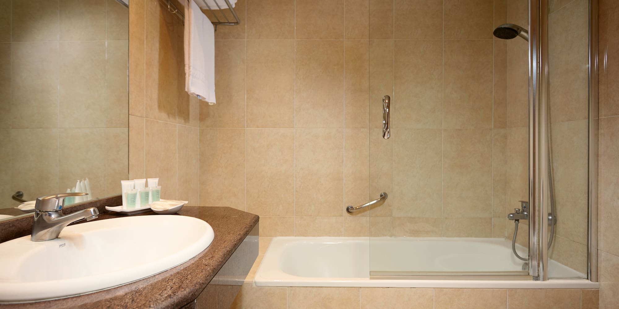 a bathroom with a bathtub and a sink