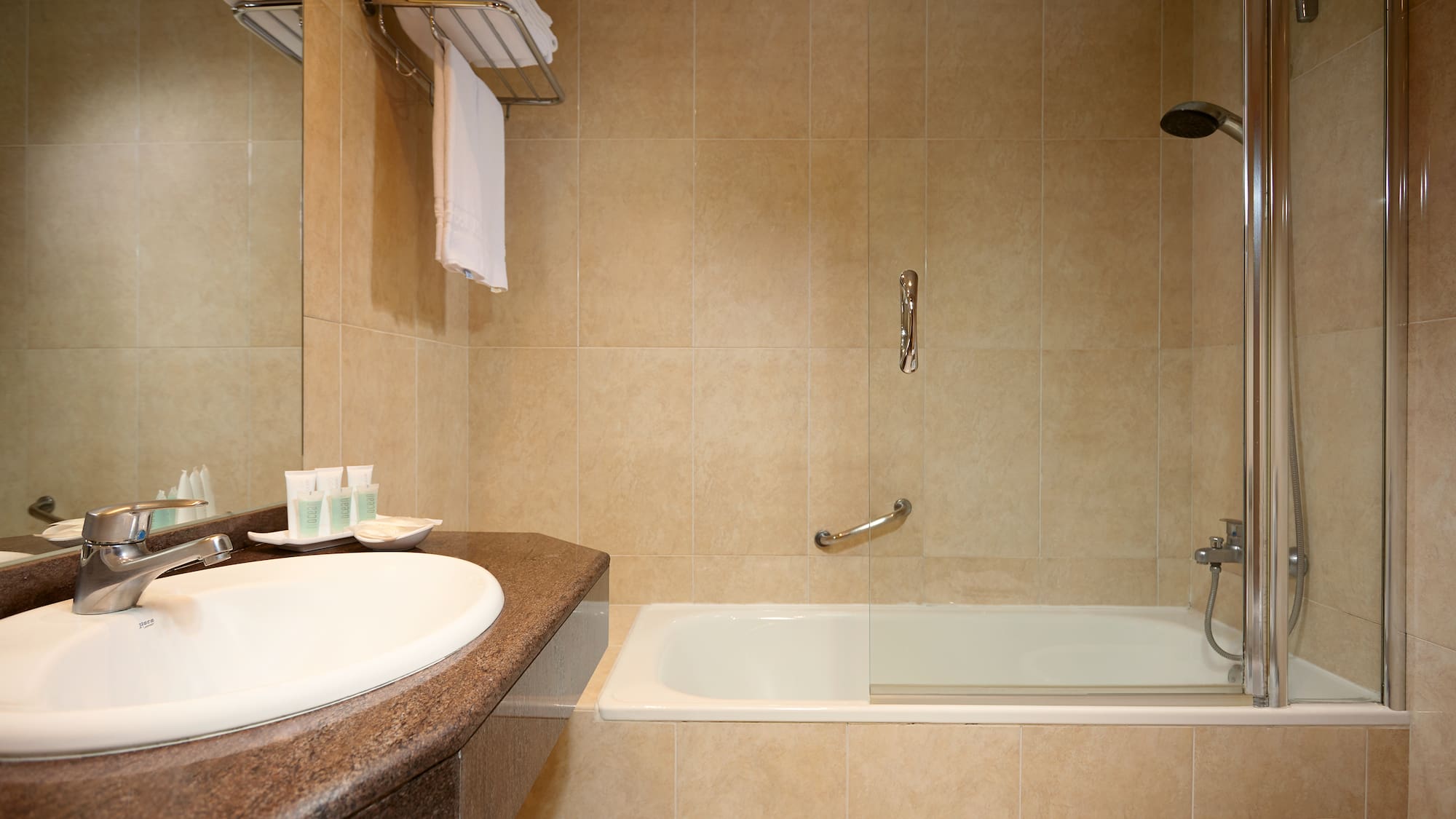 a bathroom with a bathtub and a sink