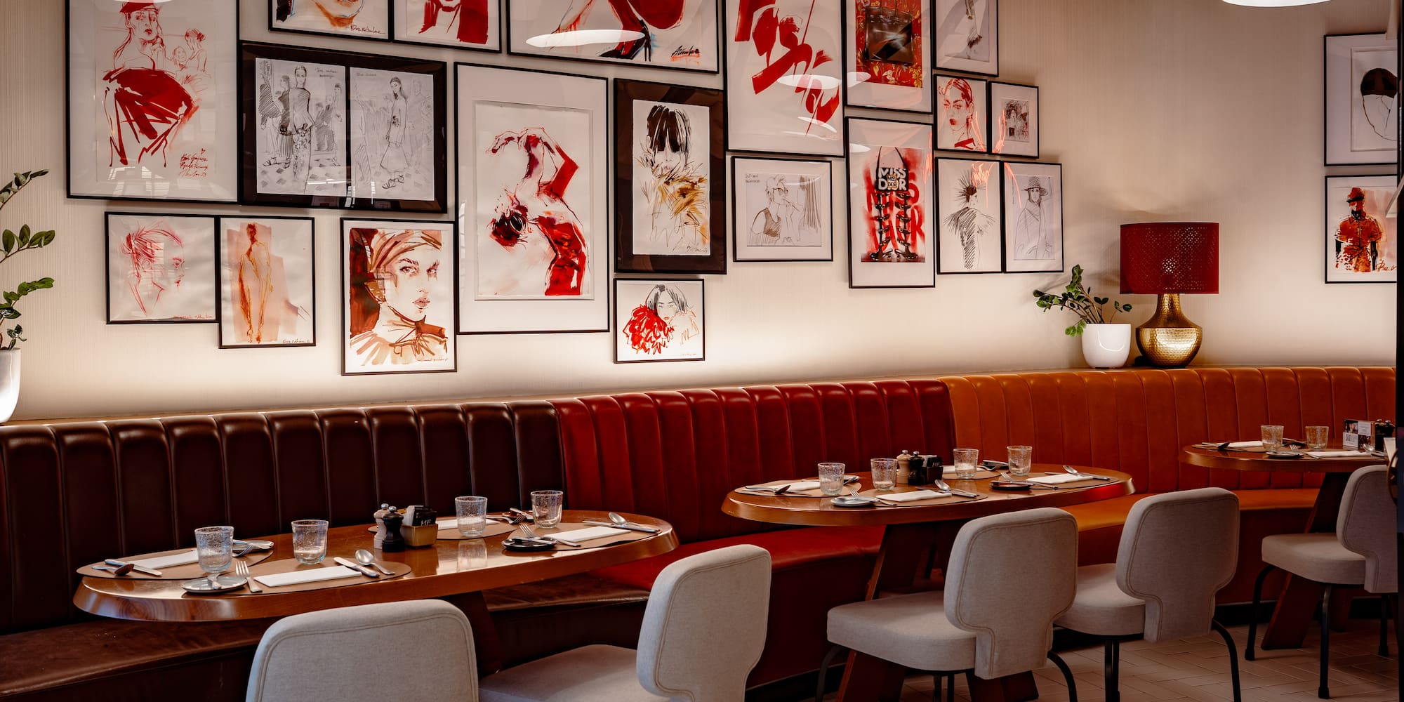 a restaurant with art on the wall