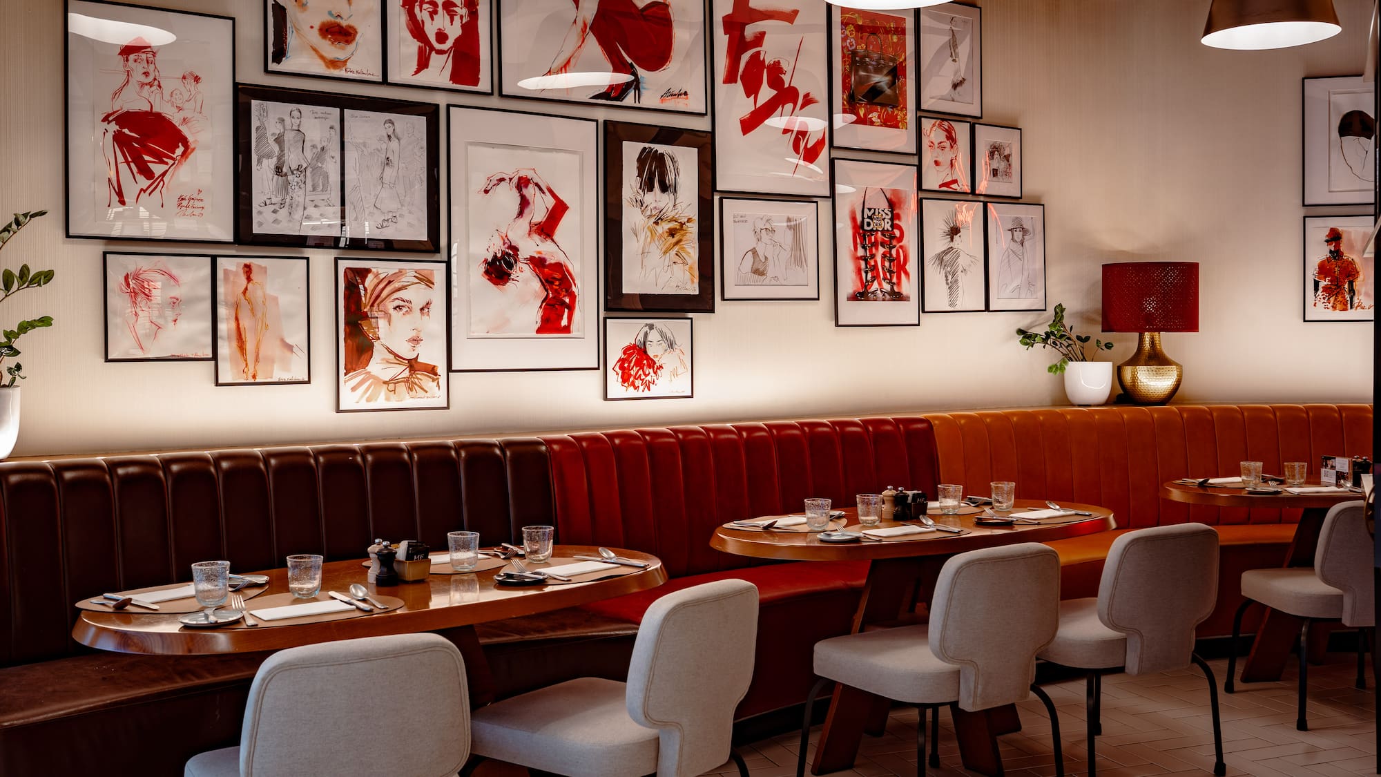 a restaurant with art on the wall