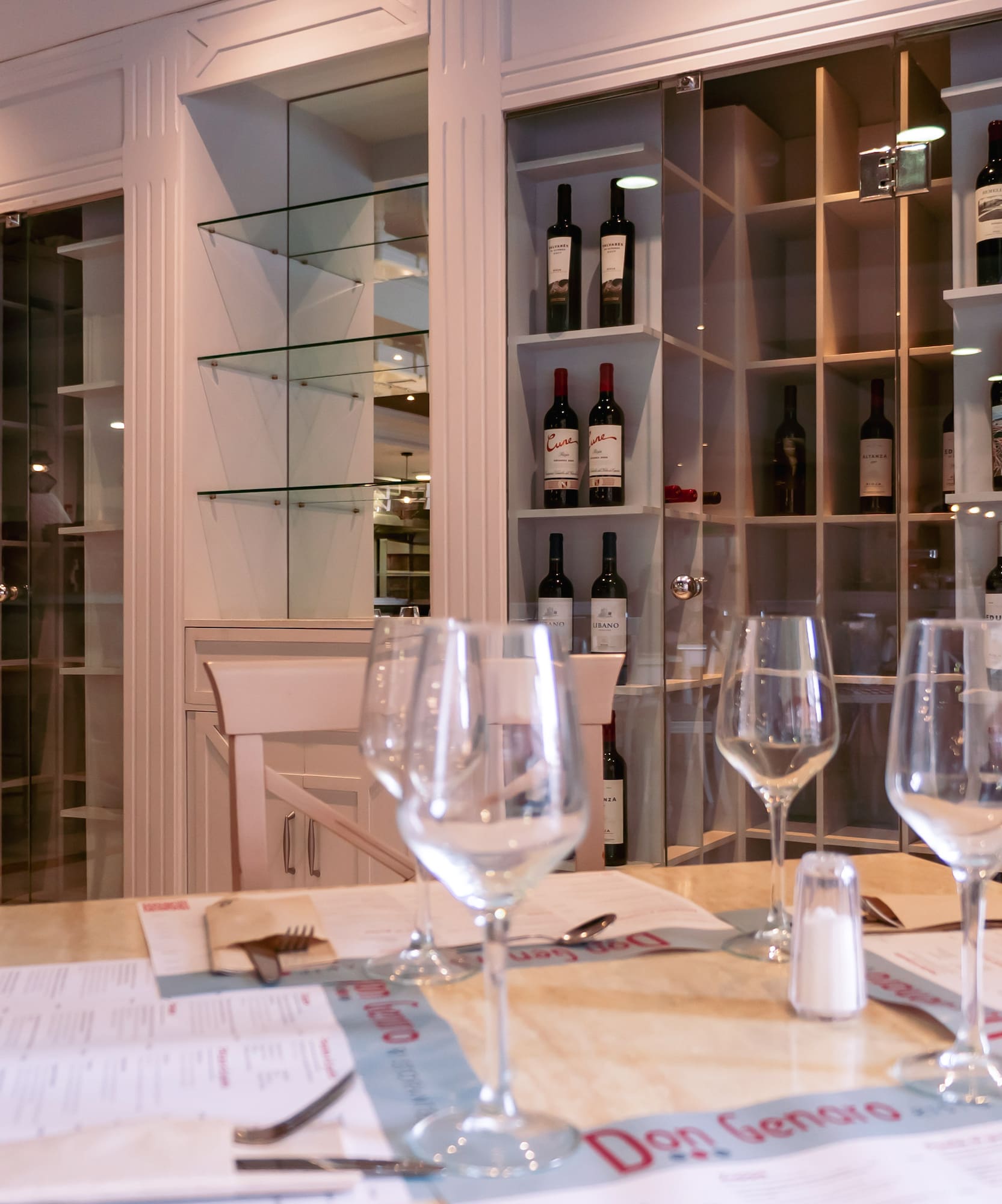 wine glasses on a table in a restaurant