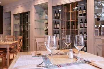 wine glasses on a table in a restaurant