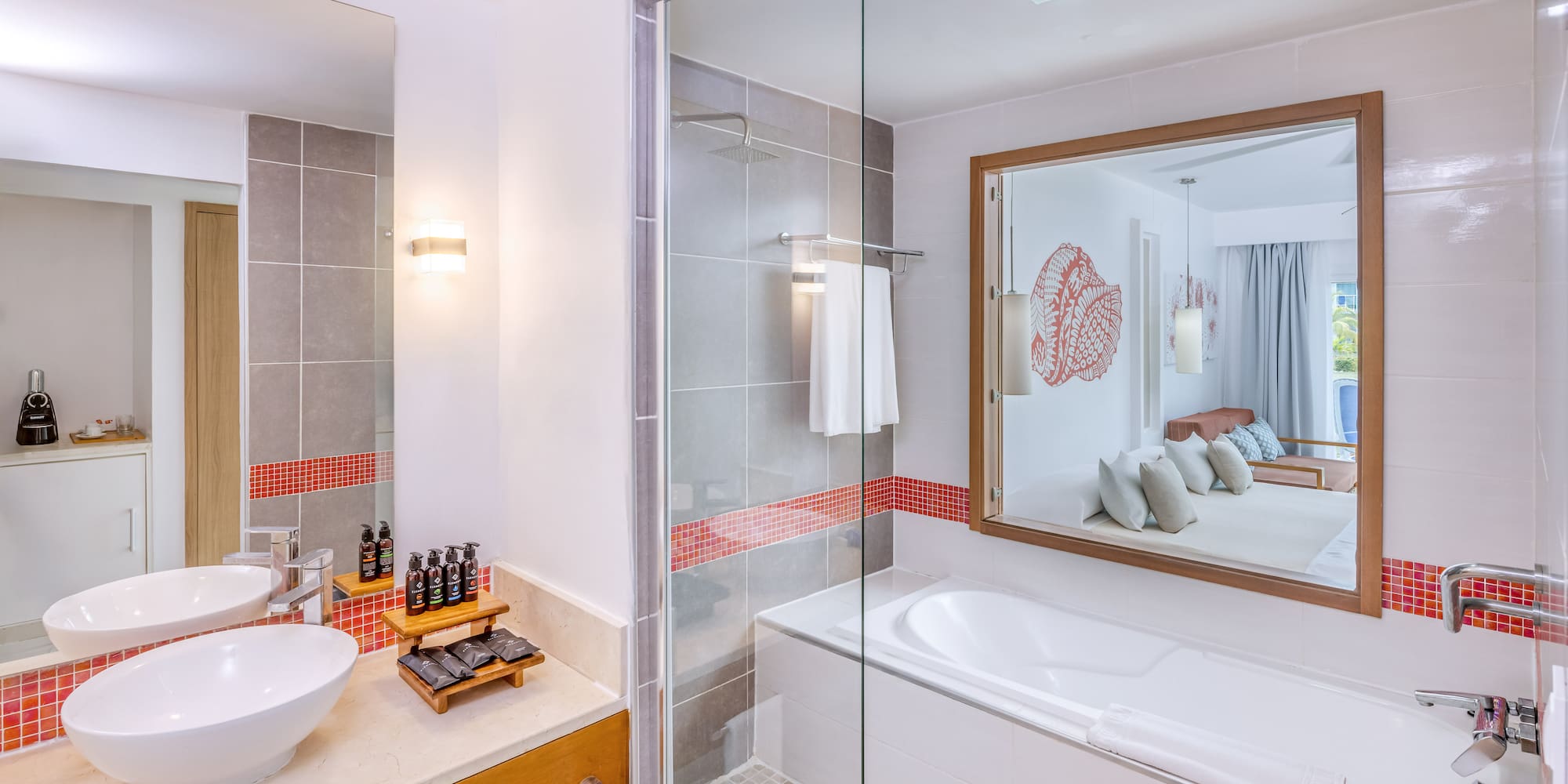 a bathroom with a glass shower and a bathtub