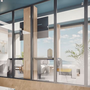 a room with glass walls and a large window