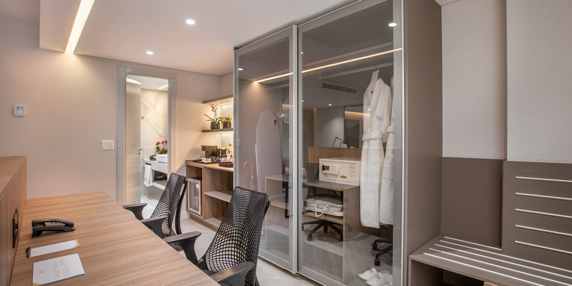 a room with a table and chairs