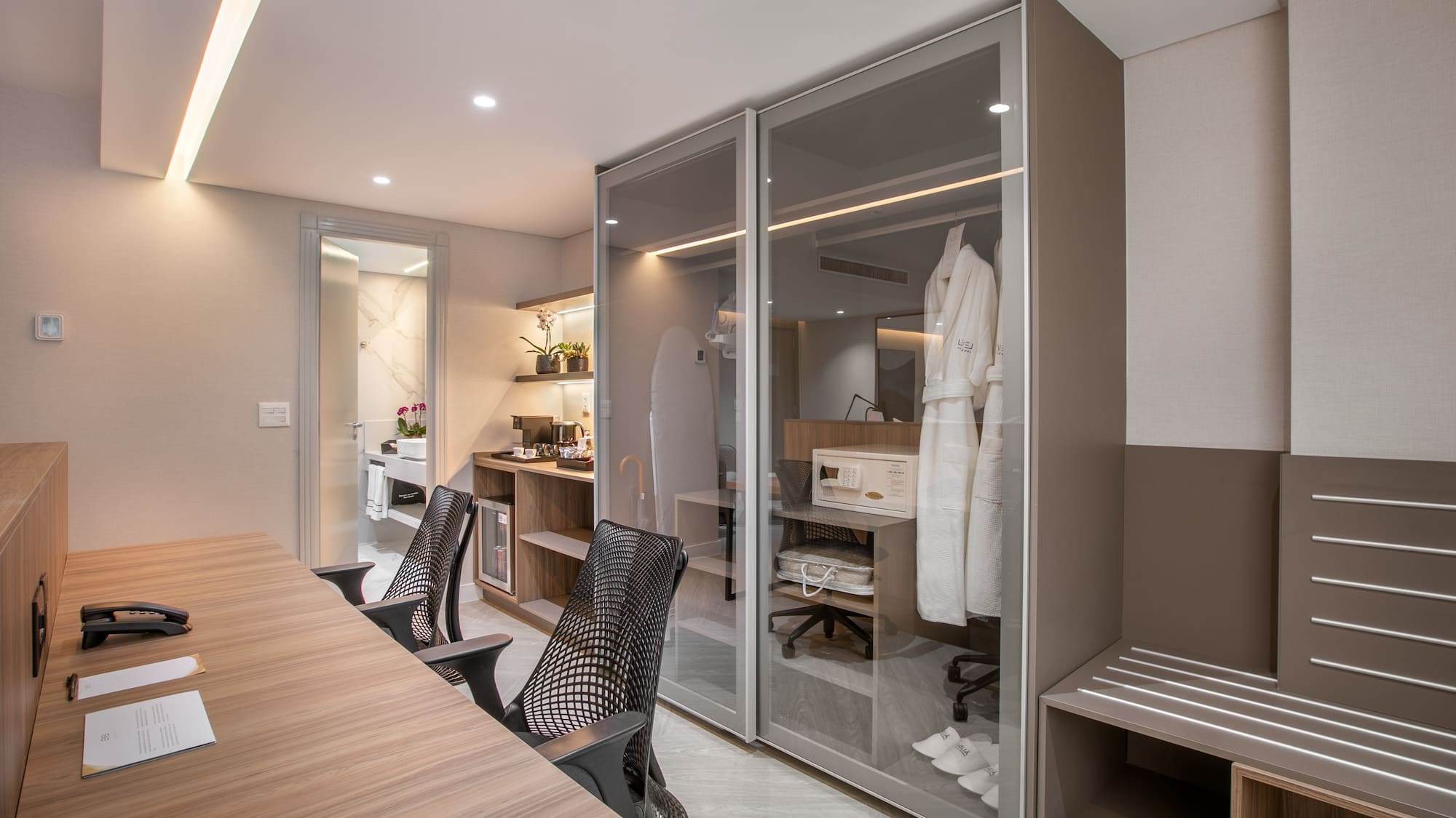 a room with a table and chairs