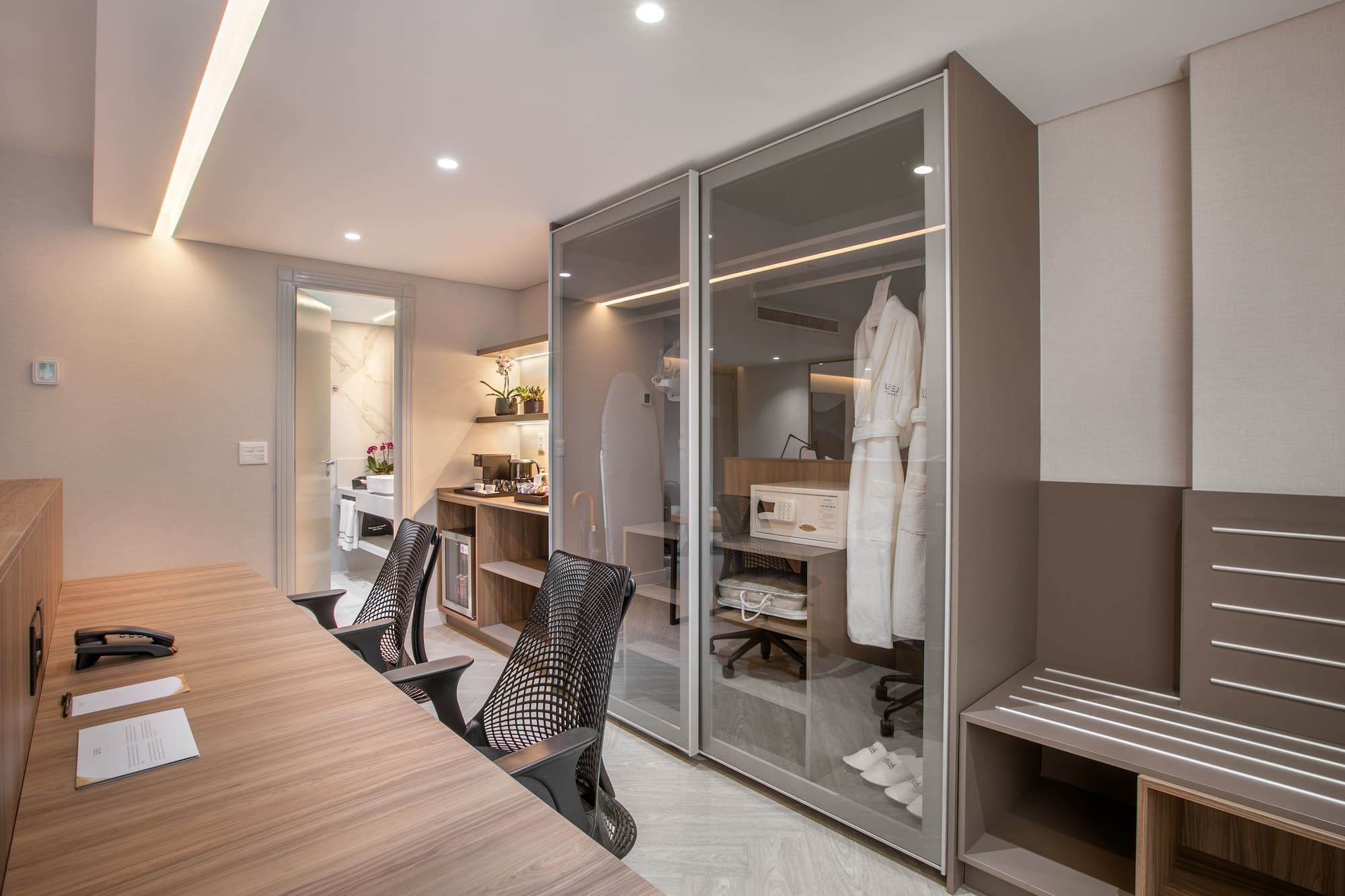 a room with a table and chairs