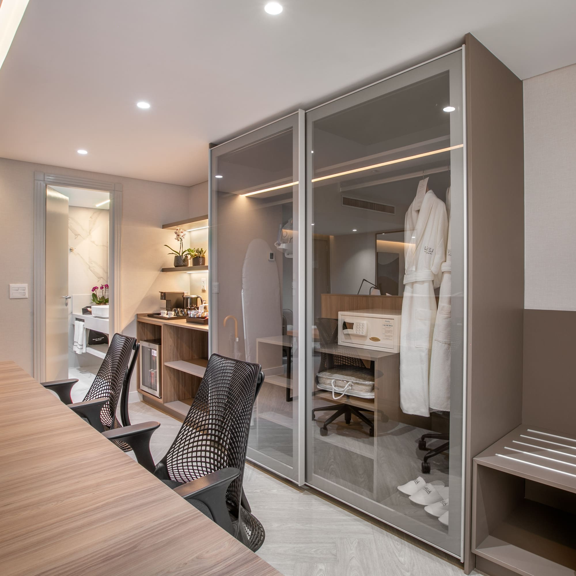 a room with a table and chairs