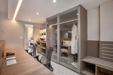 a room with a table and chairs