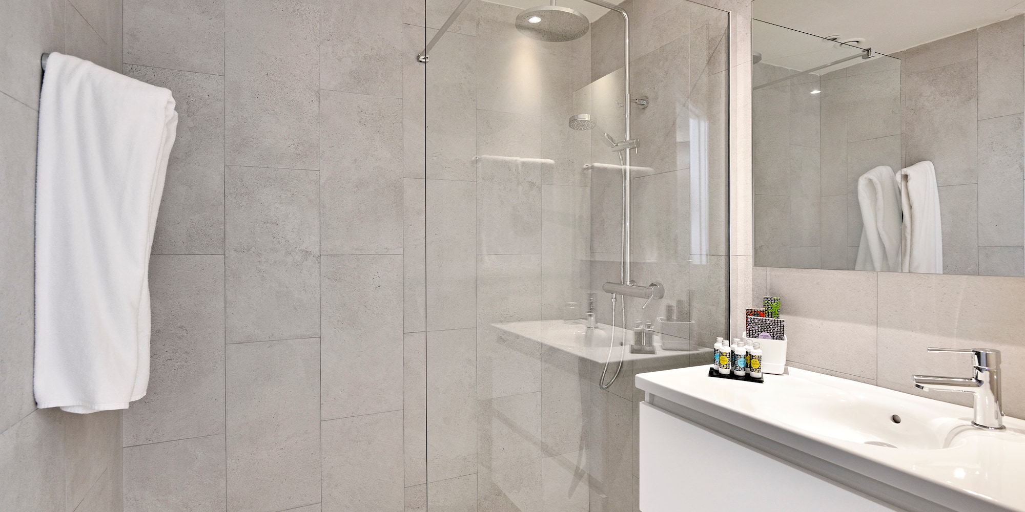 a bathroom with a glass shower