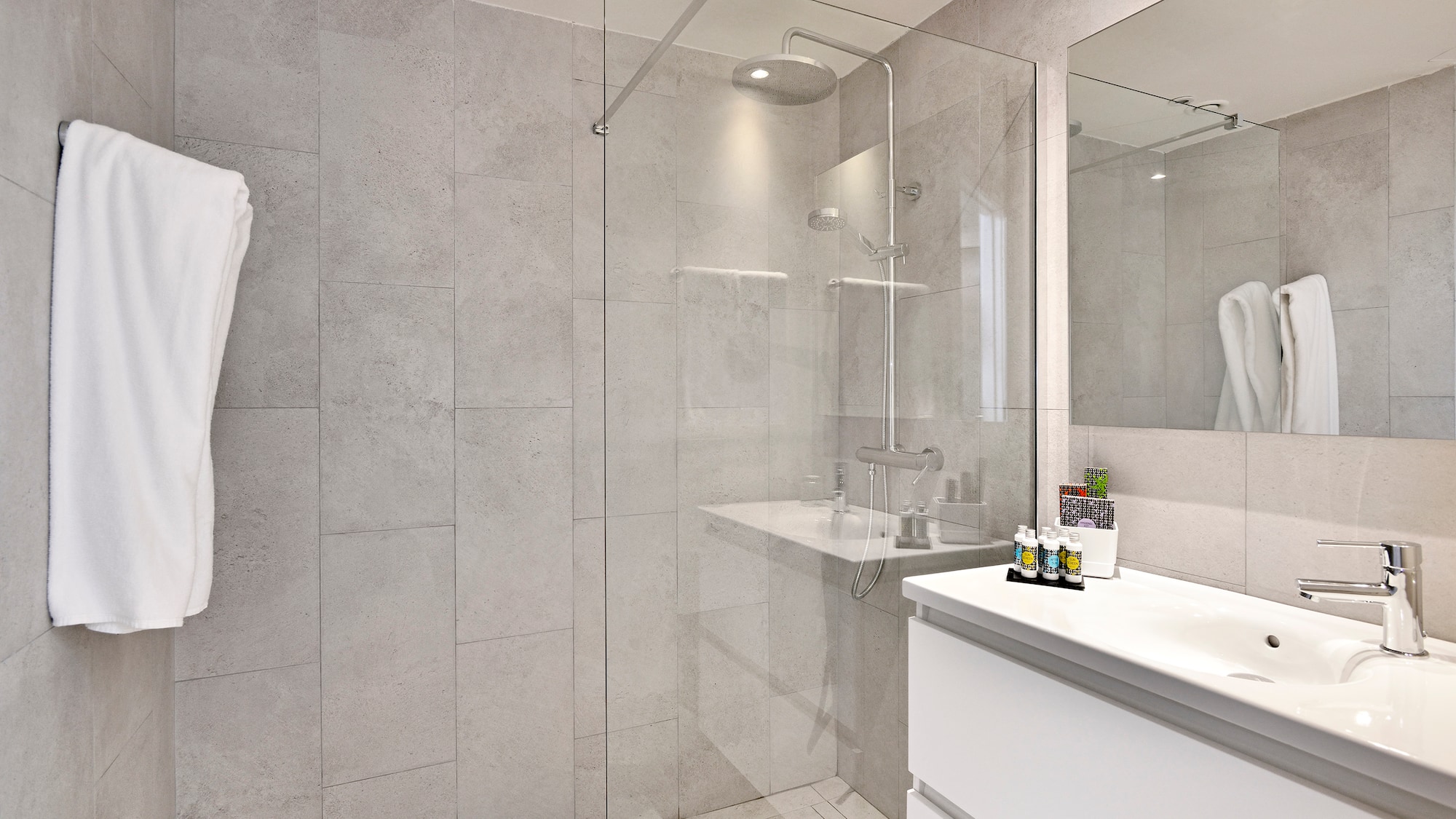 a bathroom with a glass shower