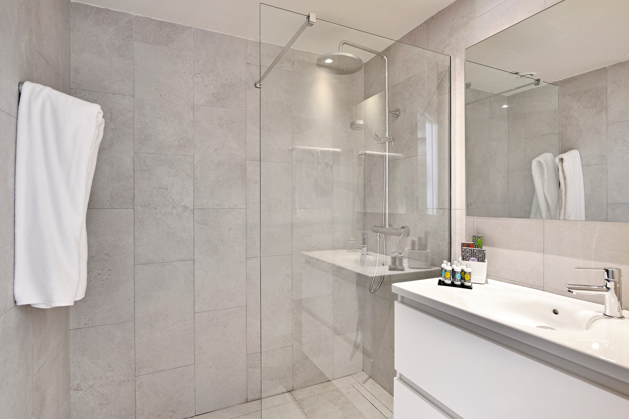 a bathroom with a glass shower