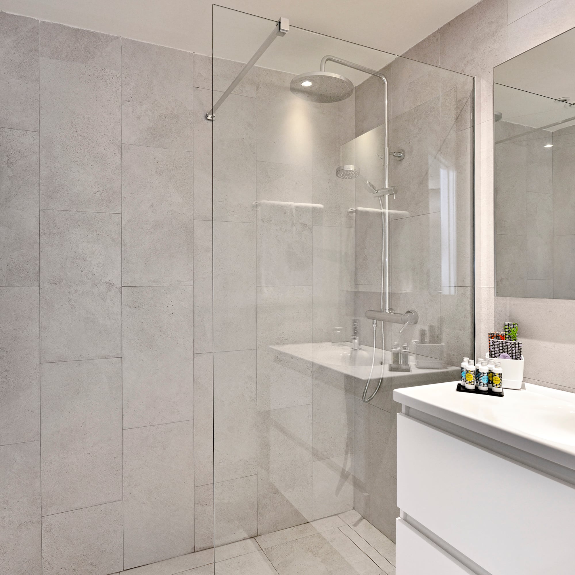 a bathroom with a glass shower