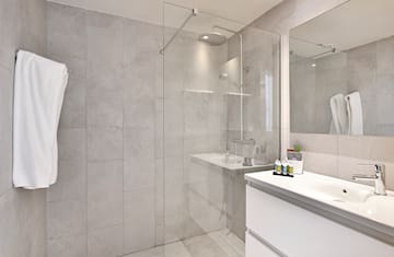 a bathroom with a glass shower