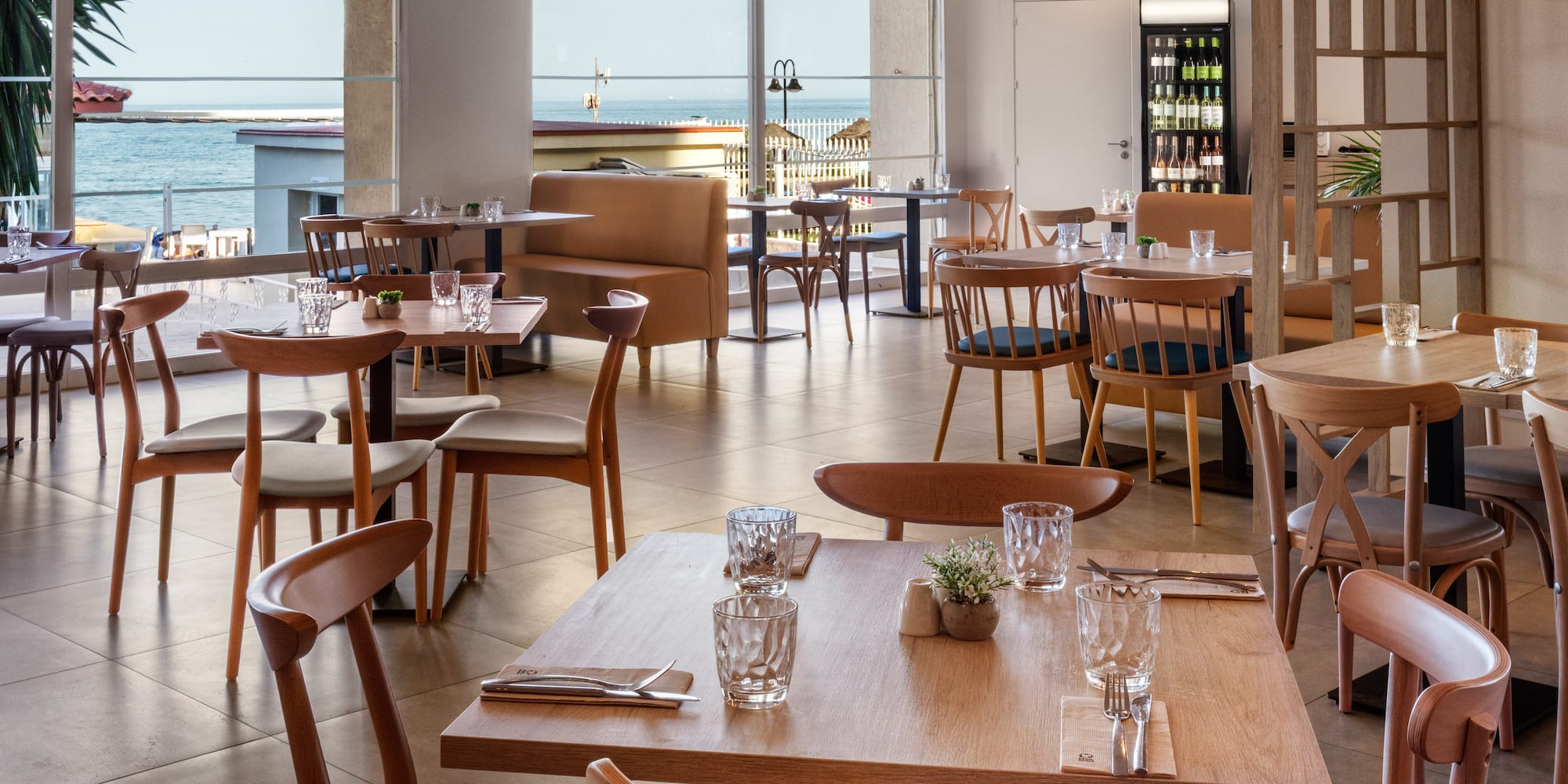 a restaurant with tables and chairs