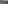 Vast olive grove with a Tuscan villa on a hill and misty hills at sunrise.