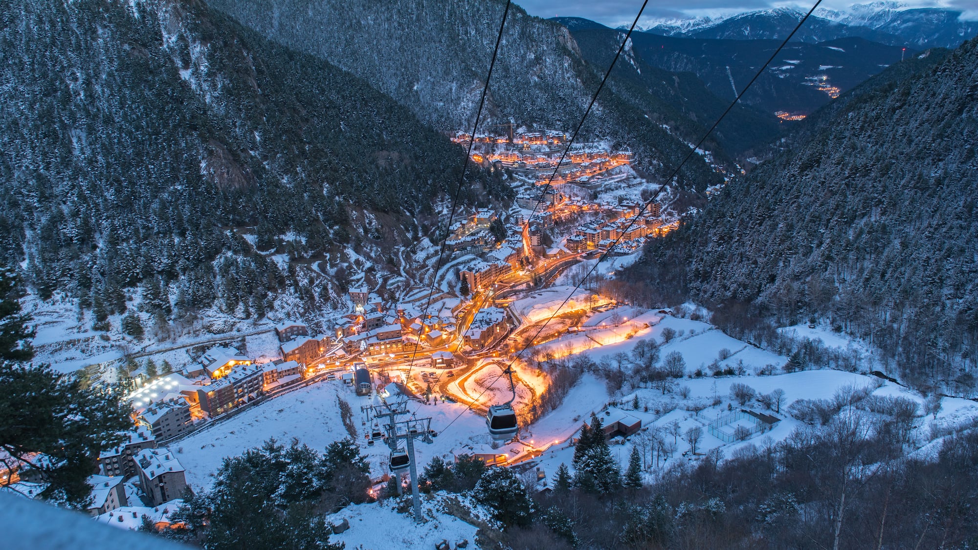 a cable car in a snowy mountain