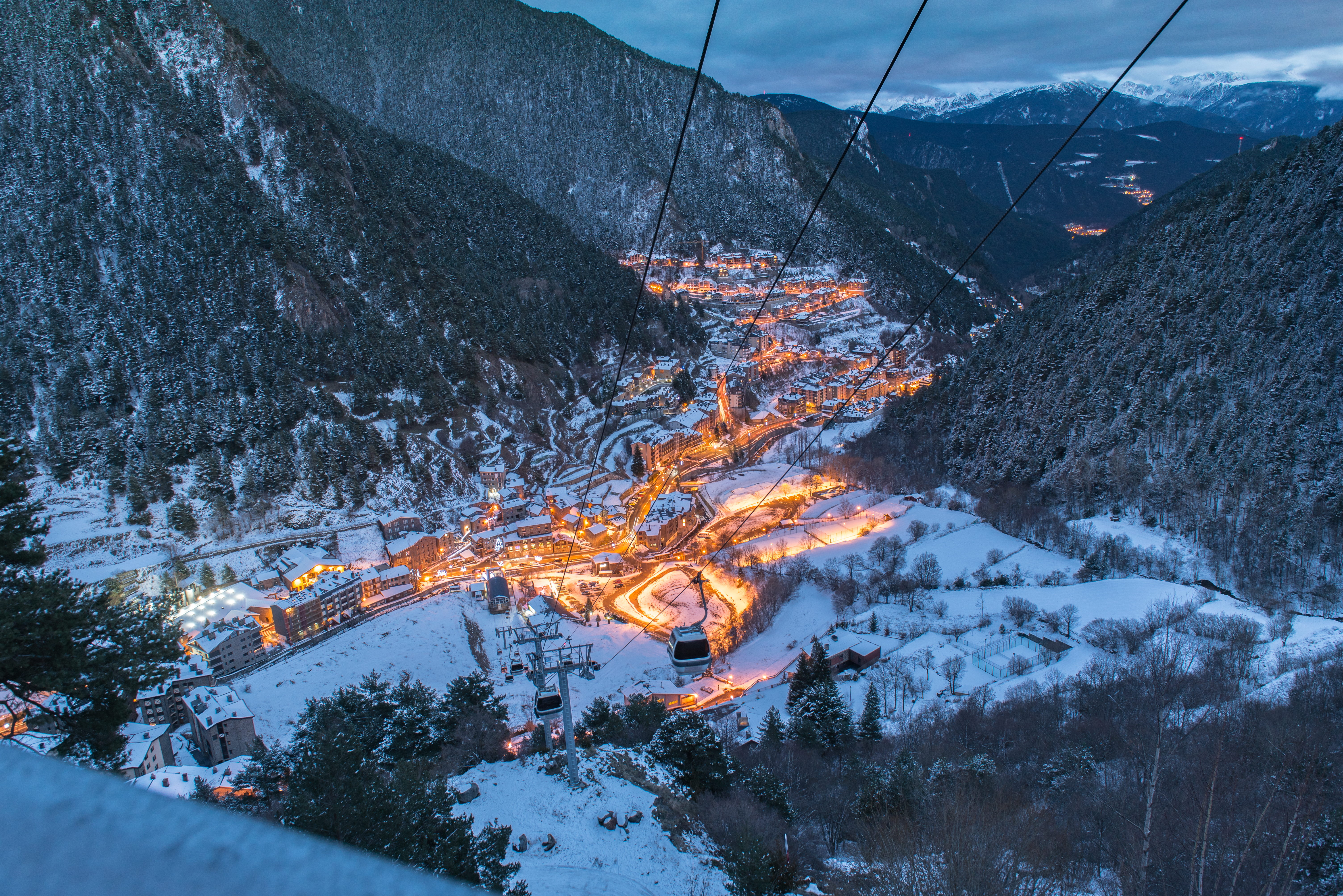 a cable car in a snowy mountain