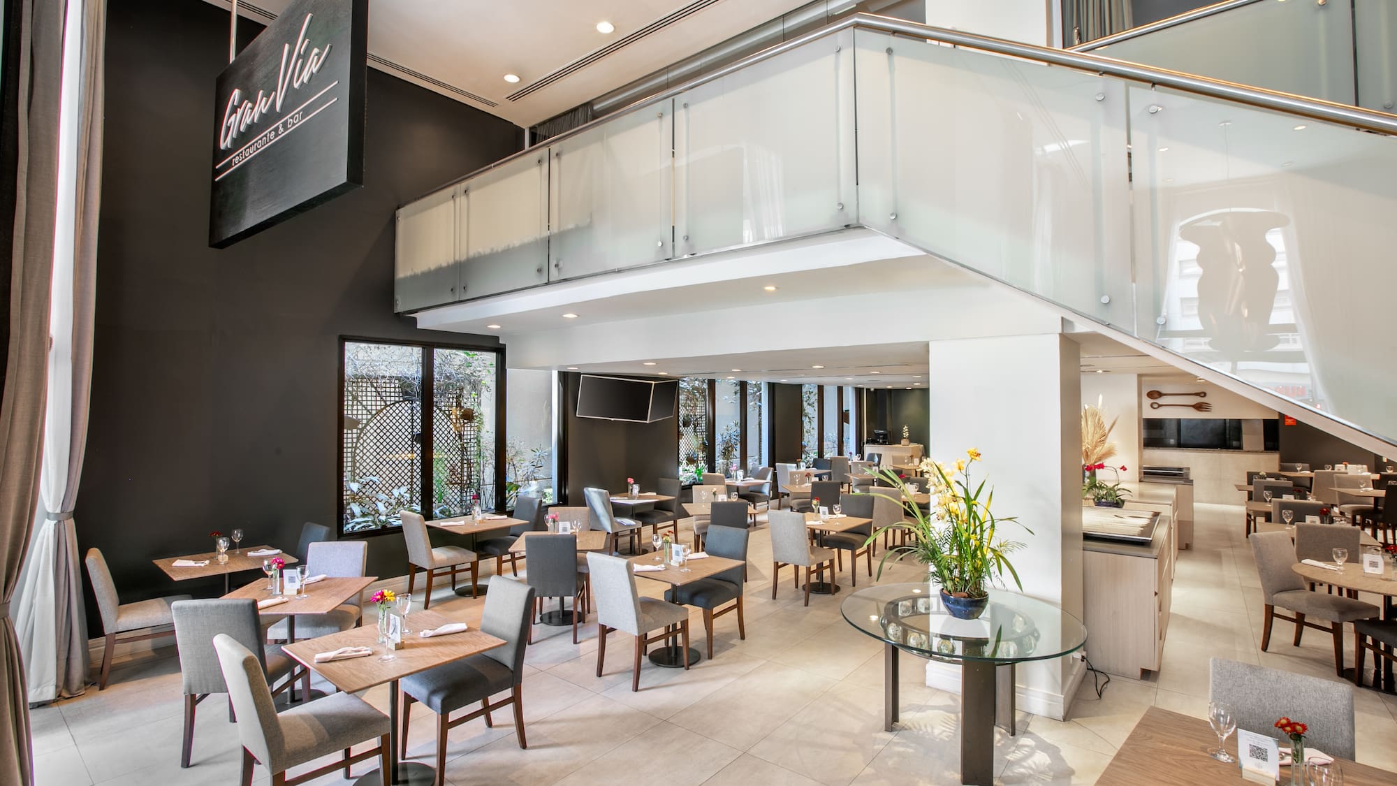 a restaurant with tables and chairs