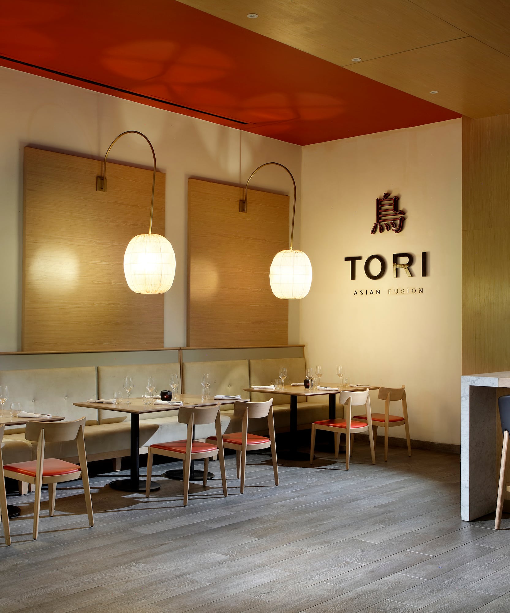 a restaurant with tables and chairs