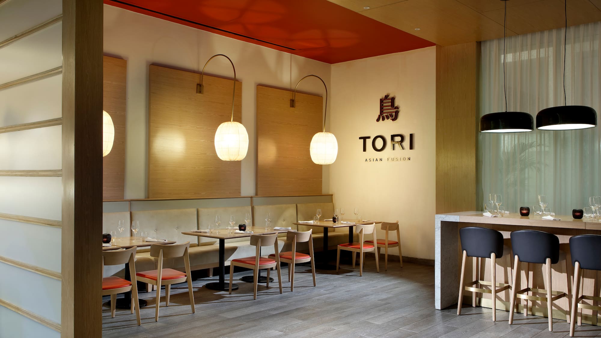 a restaurant with tables and chairs