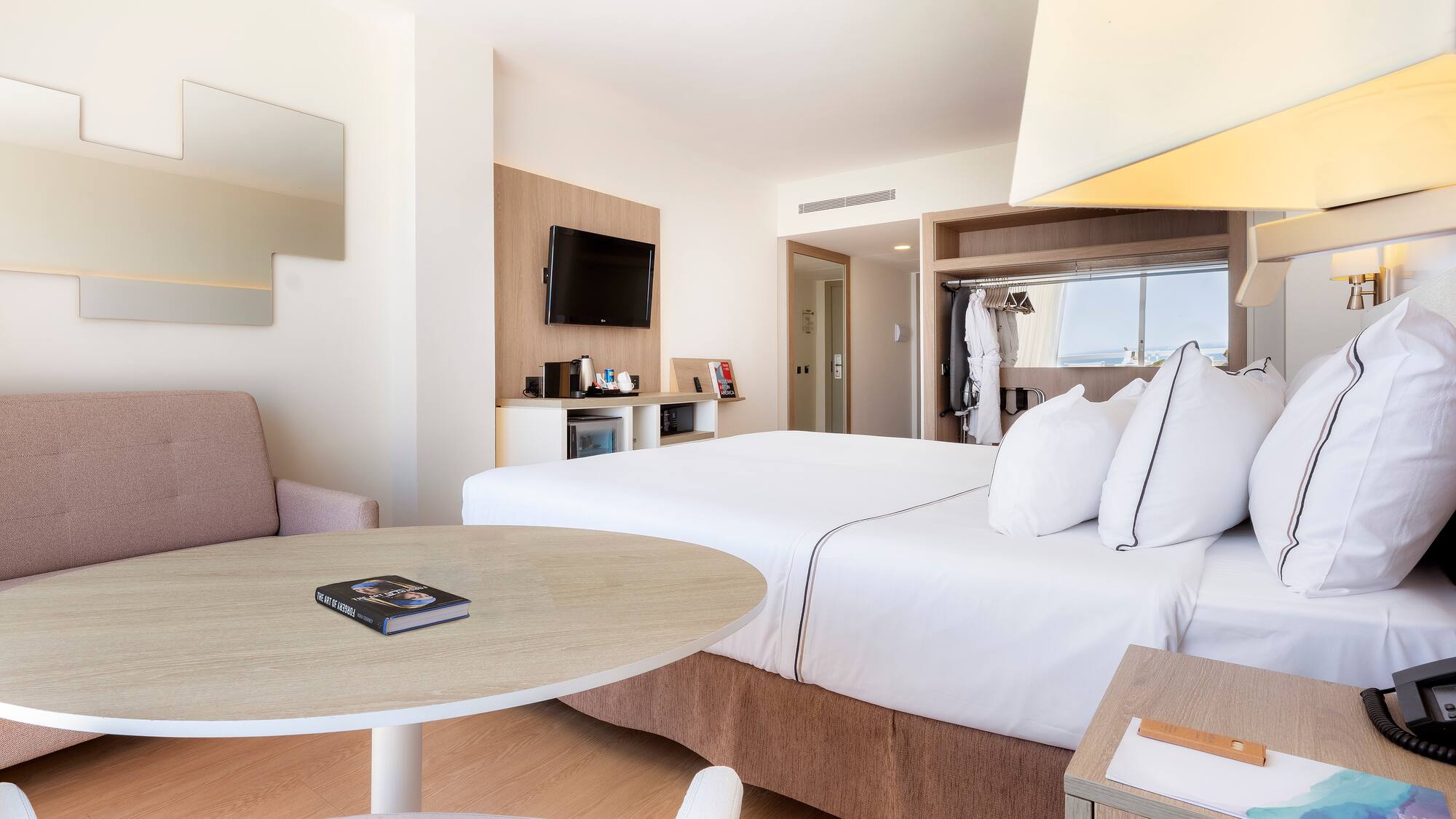 a room with a bed and a table