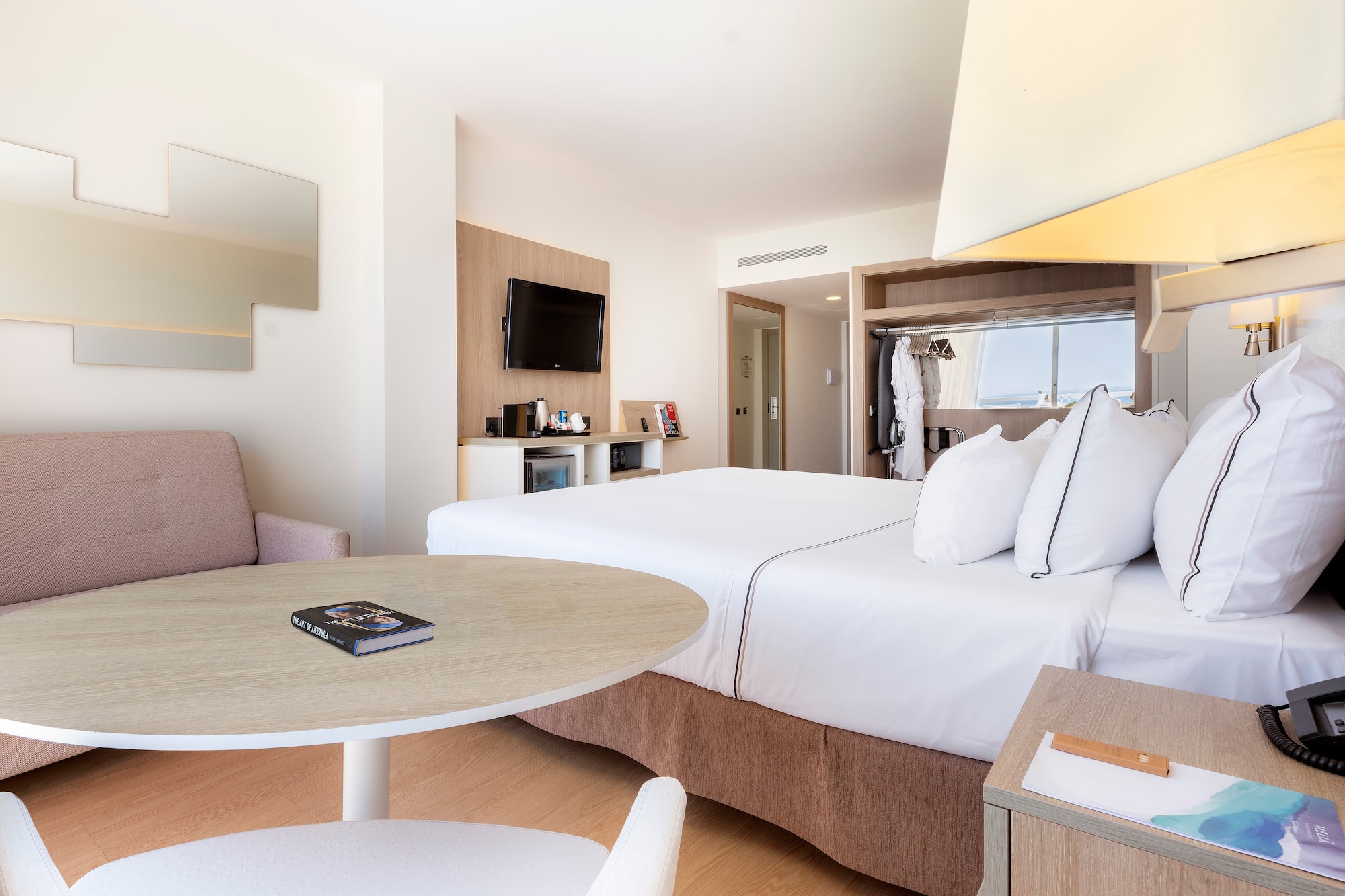 a room with a bed and a table