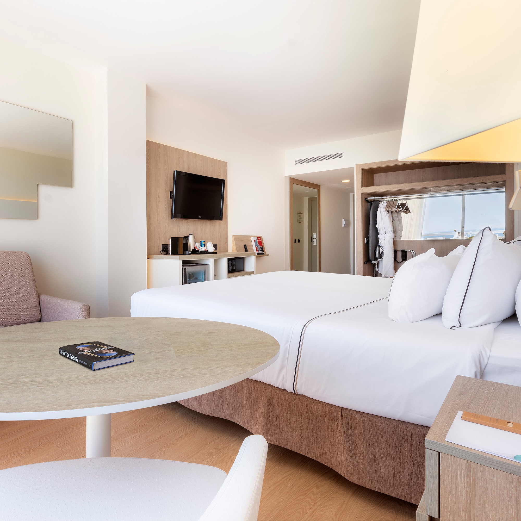 a room with a bed and a table