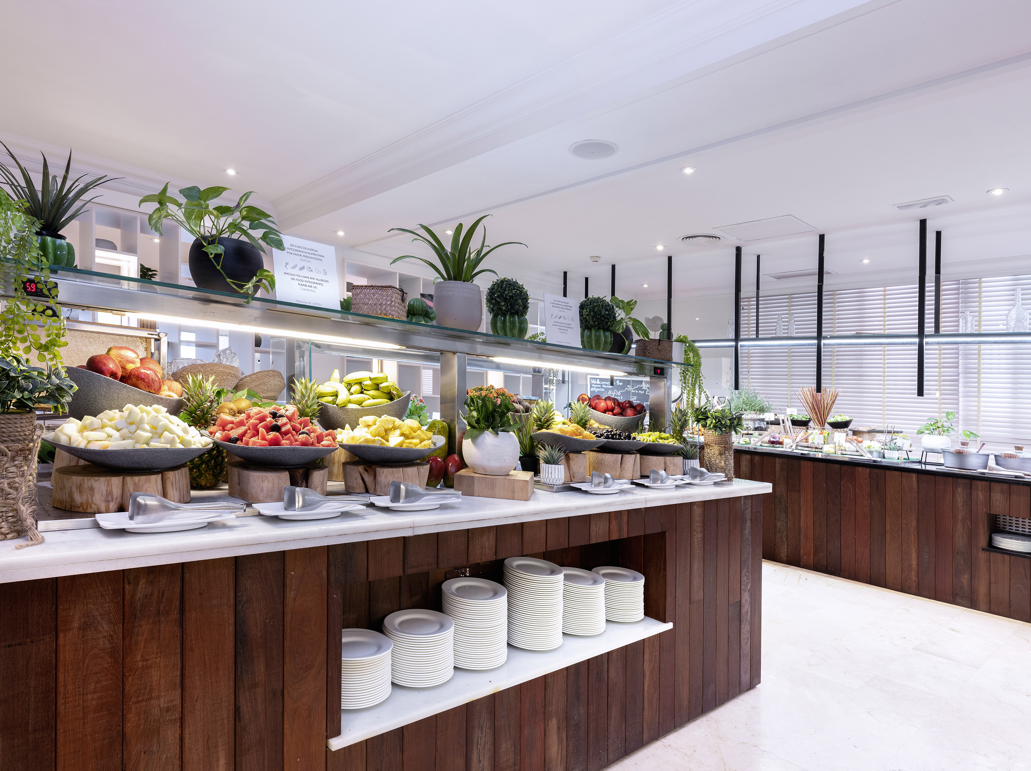 Fresh fruit and healthy breakfast buffet in a hotel restaurant.