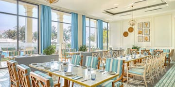 a room with tables and chairs