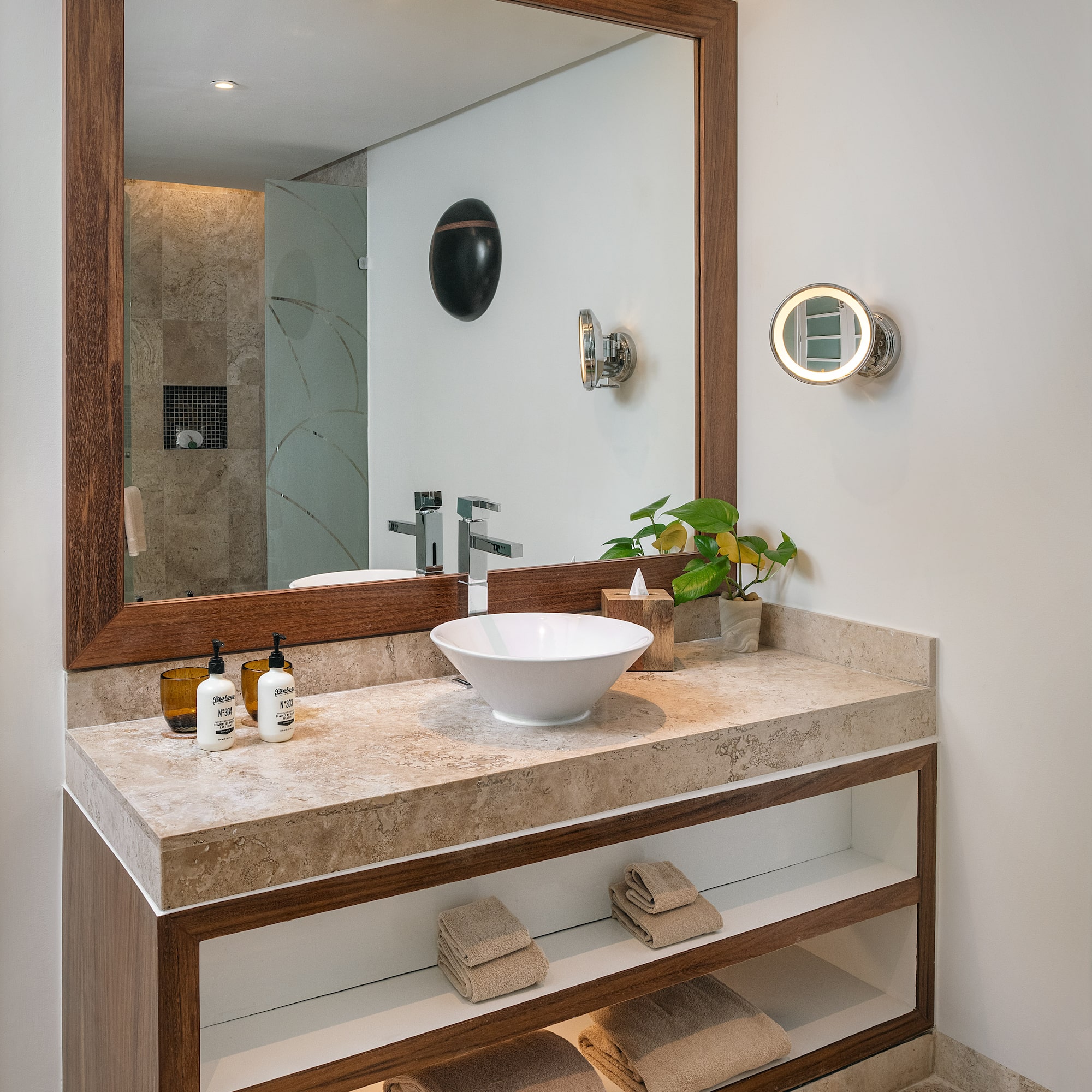 a bathroom with a mirror and sink