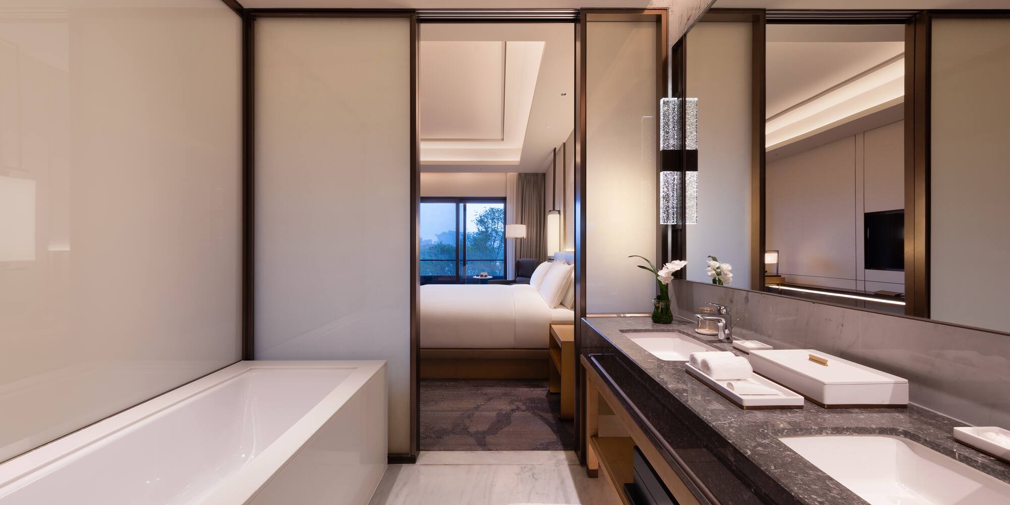 a bathroom with a bathtub and sink