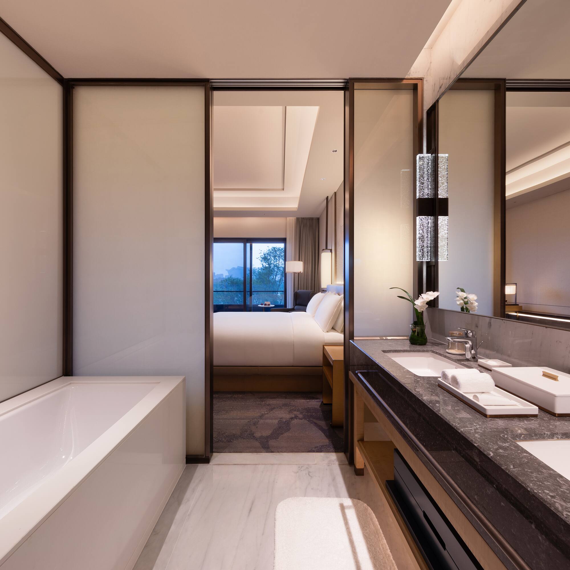 a bathroom with a bathtub and sink