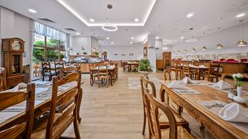 a room with tables and chairs