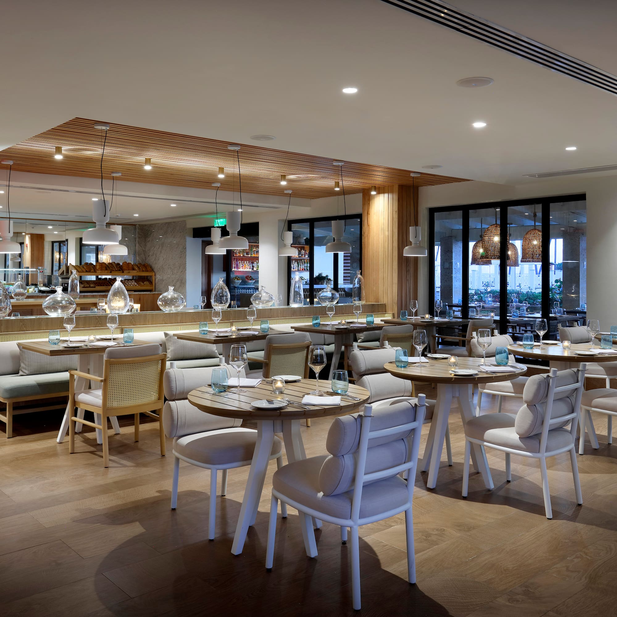 a restaurant with tables and chairs