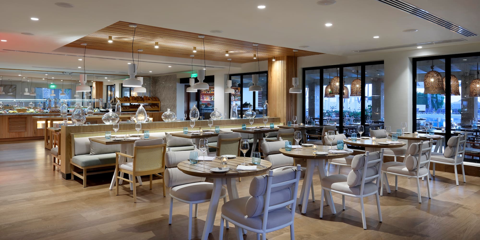 a restaurant with tables and chairs