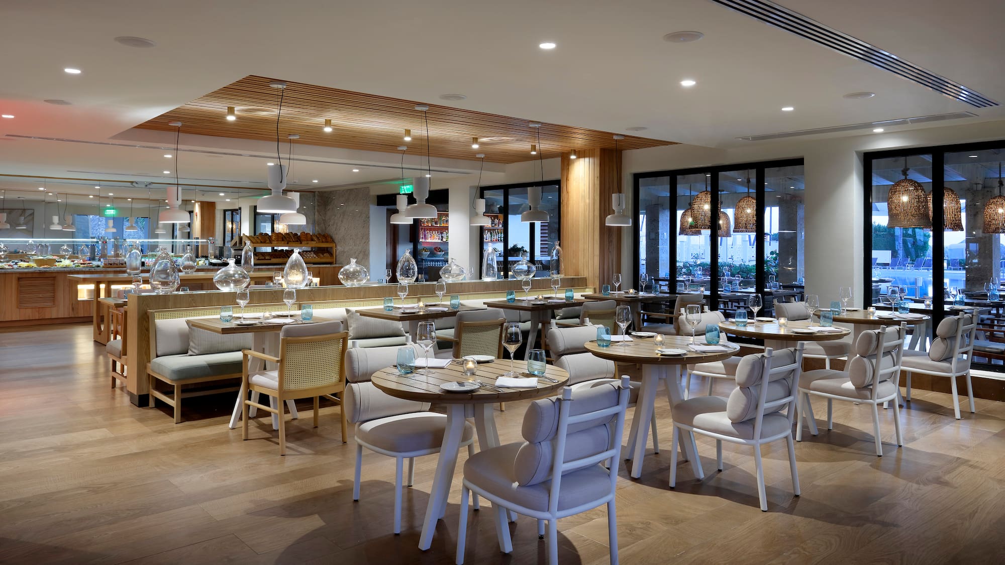 a restaurant with tables and chairs