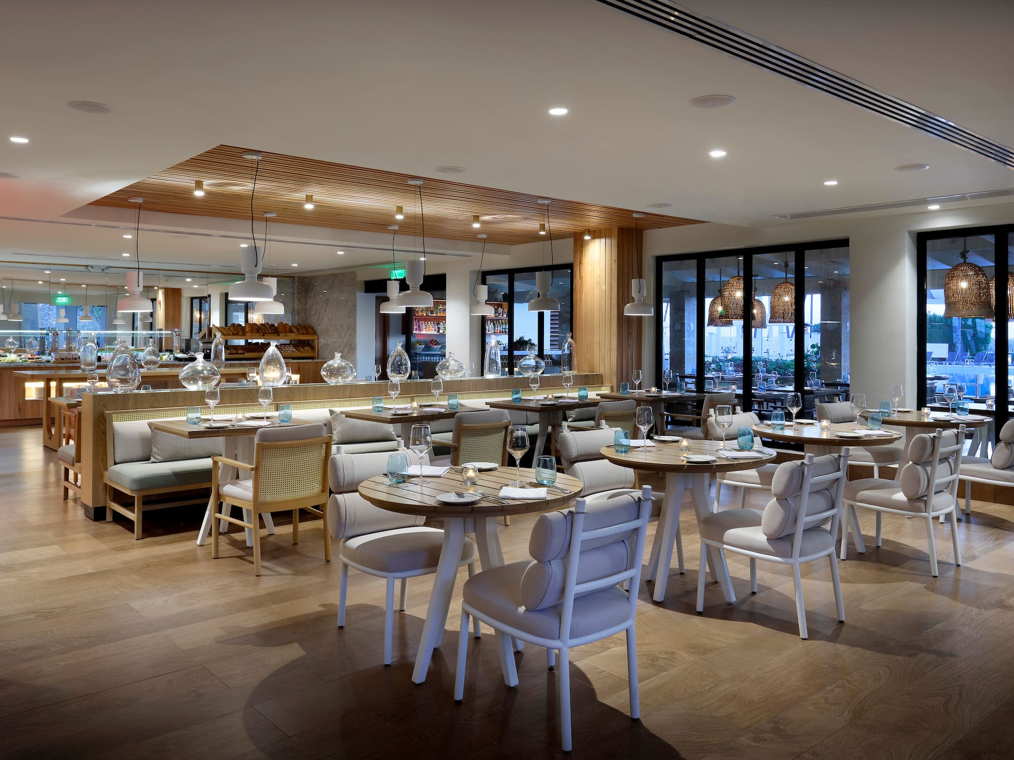 a restaurant with tables and chairs