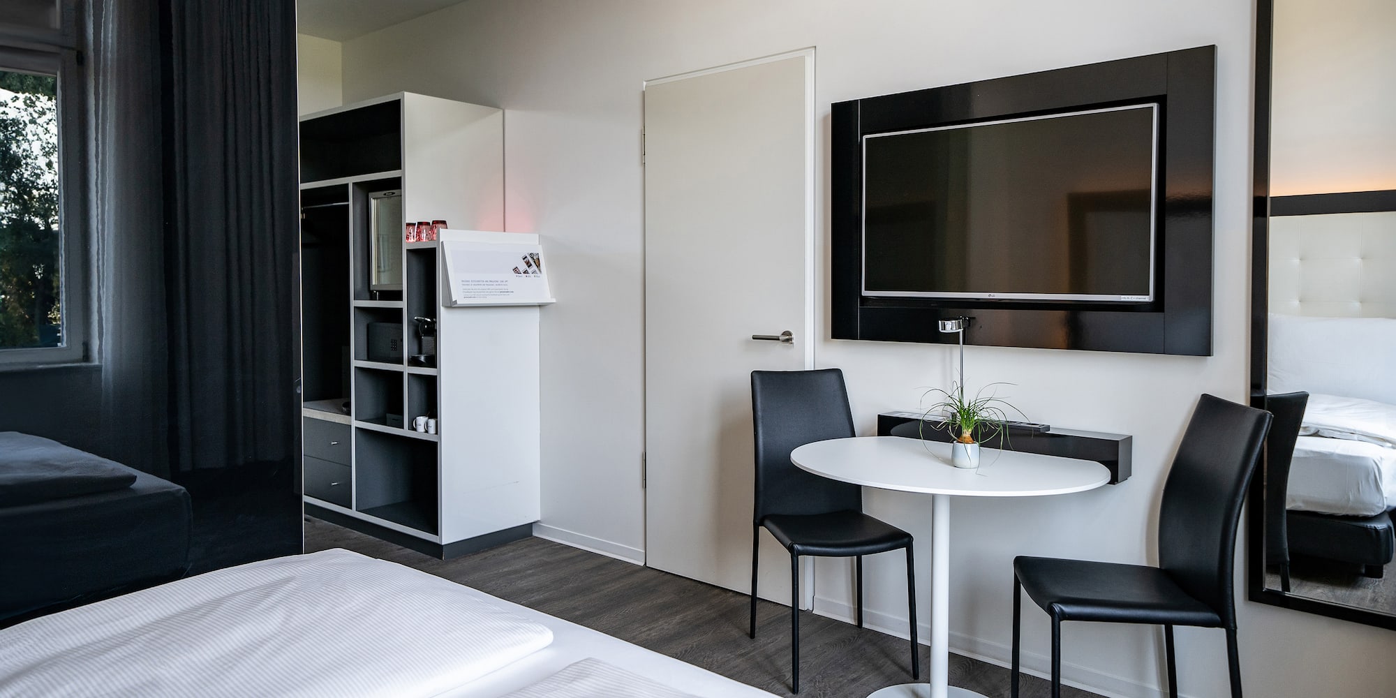 a room with a table and chairs