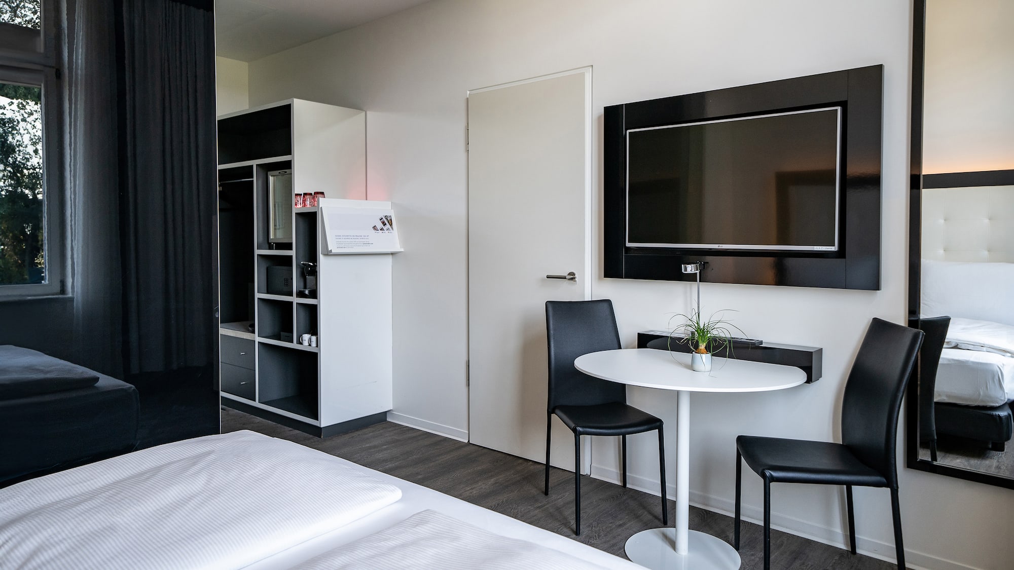 a room with a table and chairs