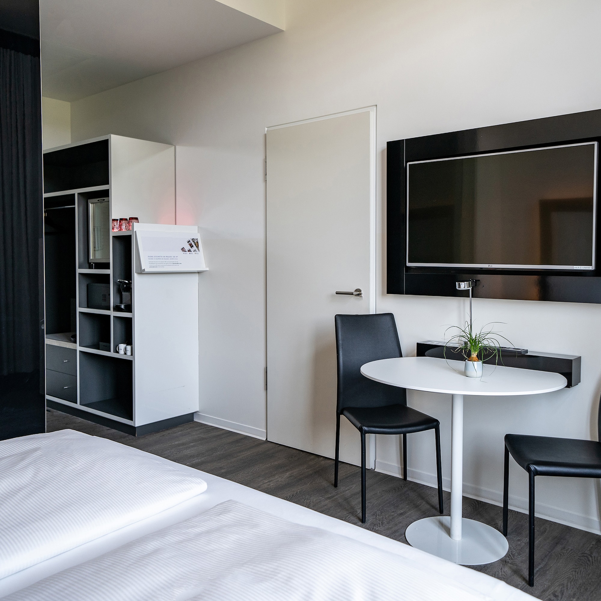 a room with a table and chairs