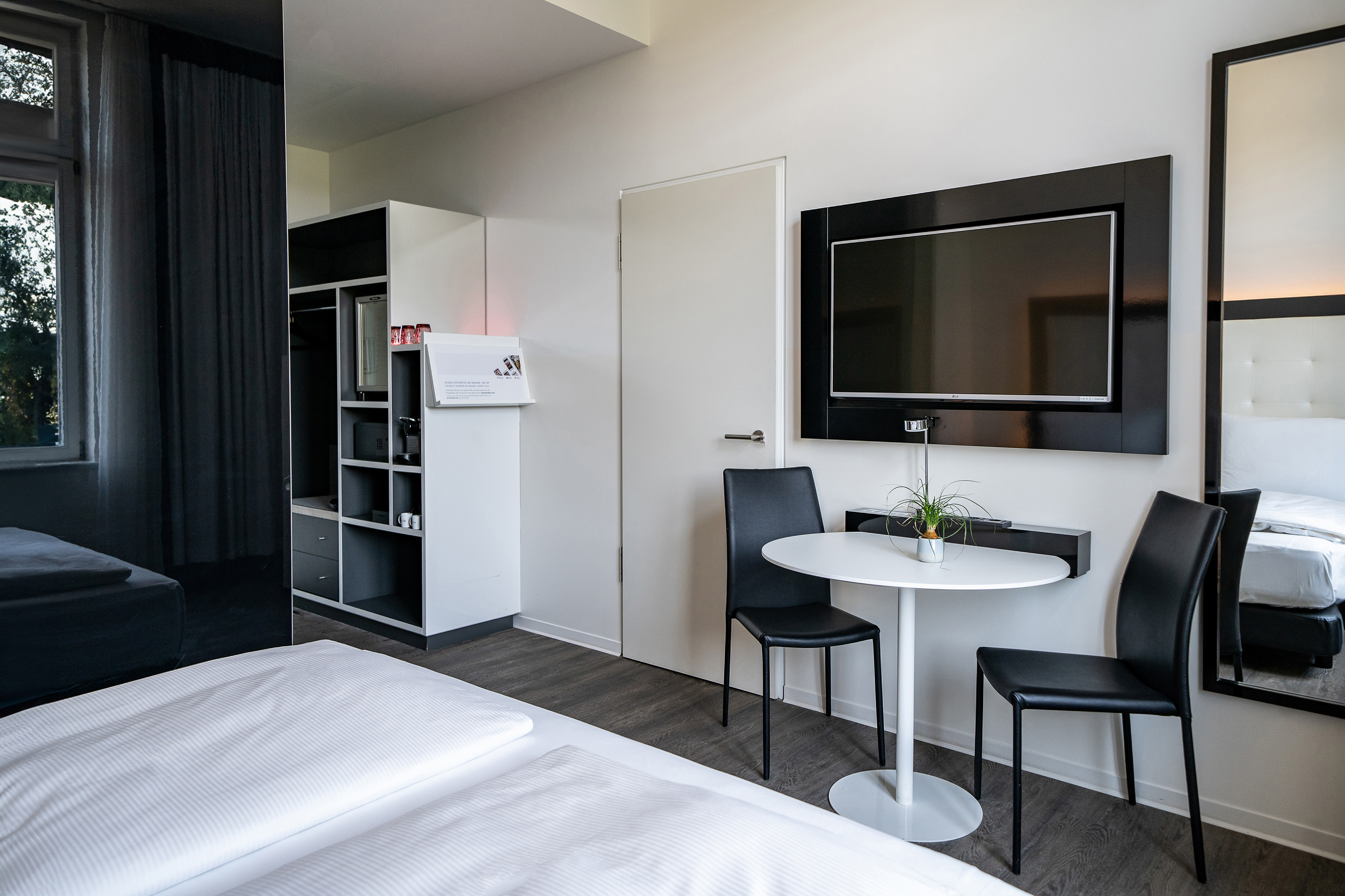 a room with a table and chairs