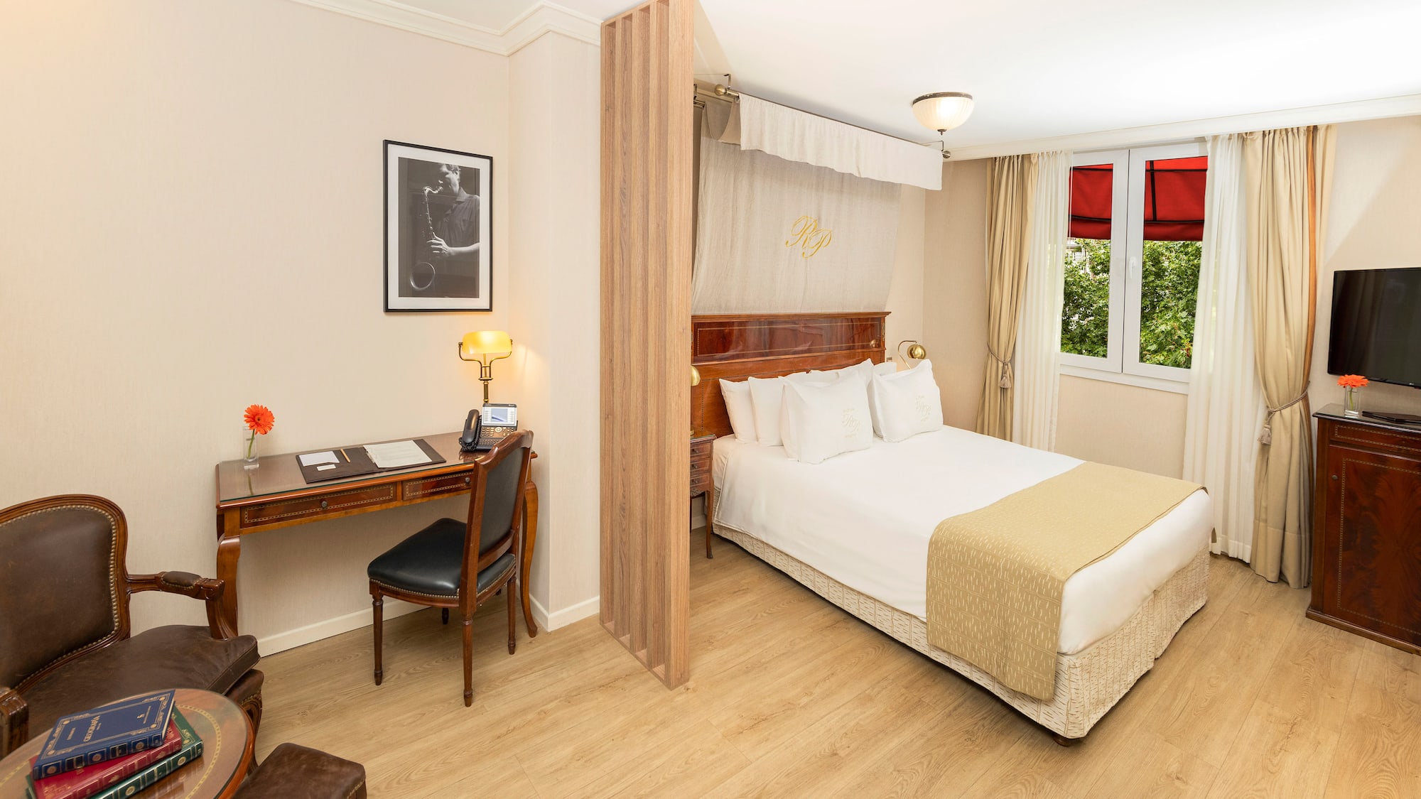 a room with a bed and a desk