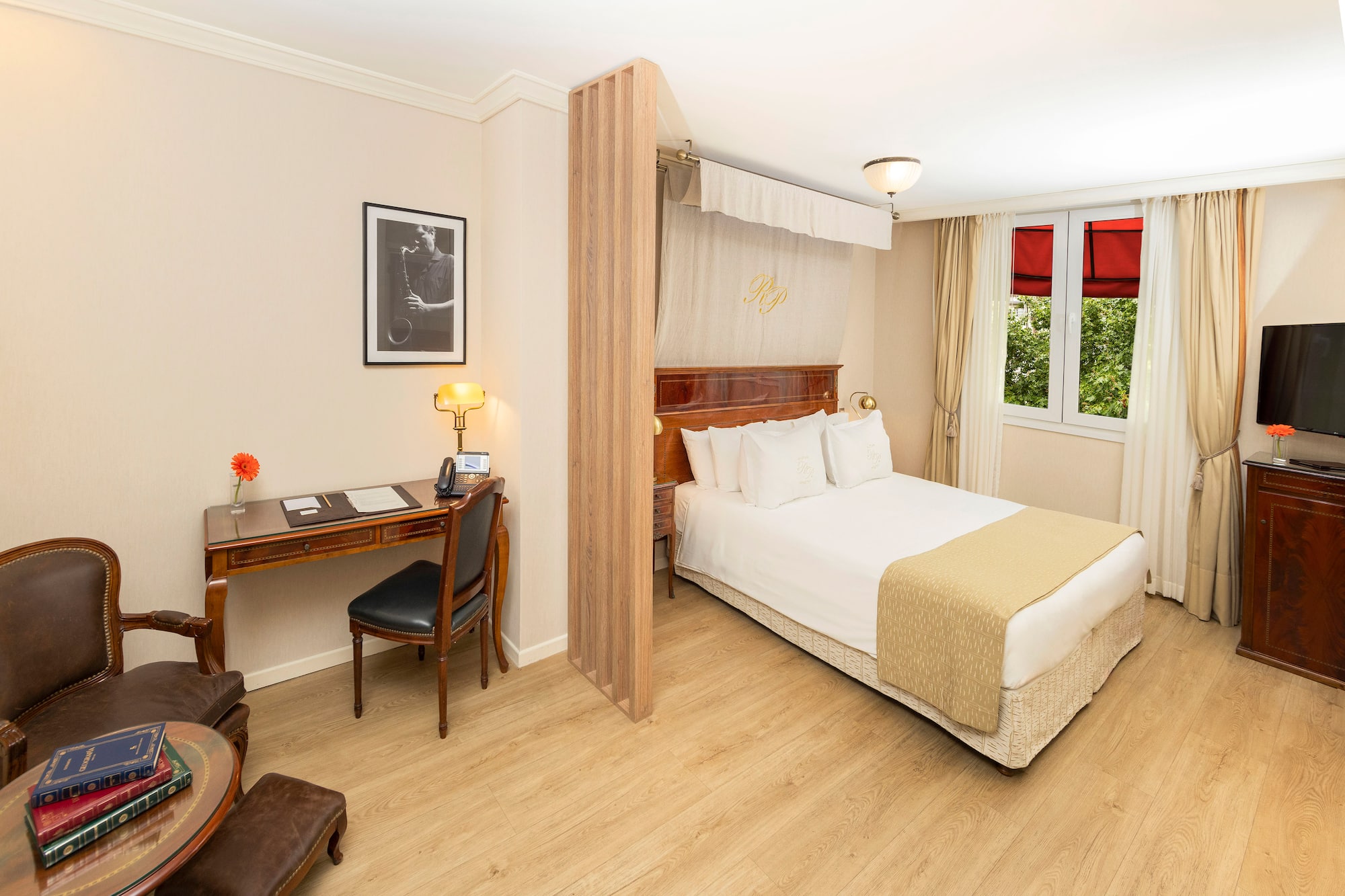 a room with a bed and a desk