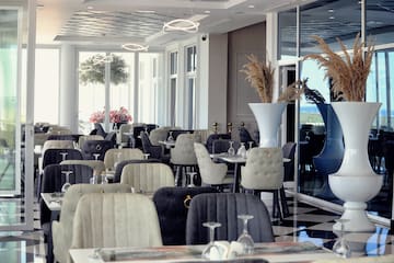 a room with tables and chairs