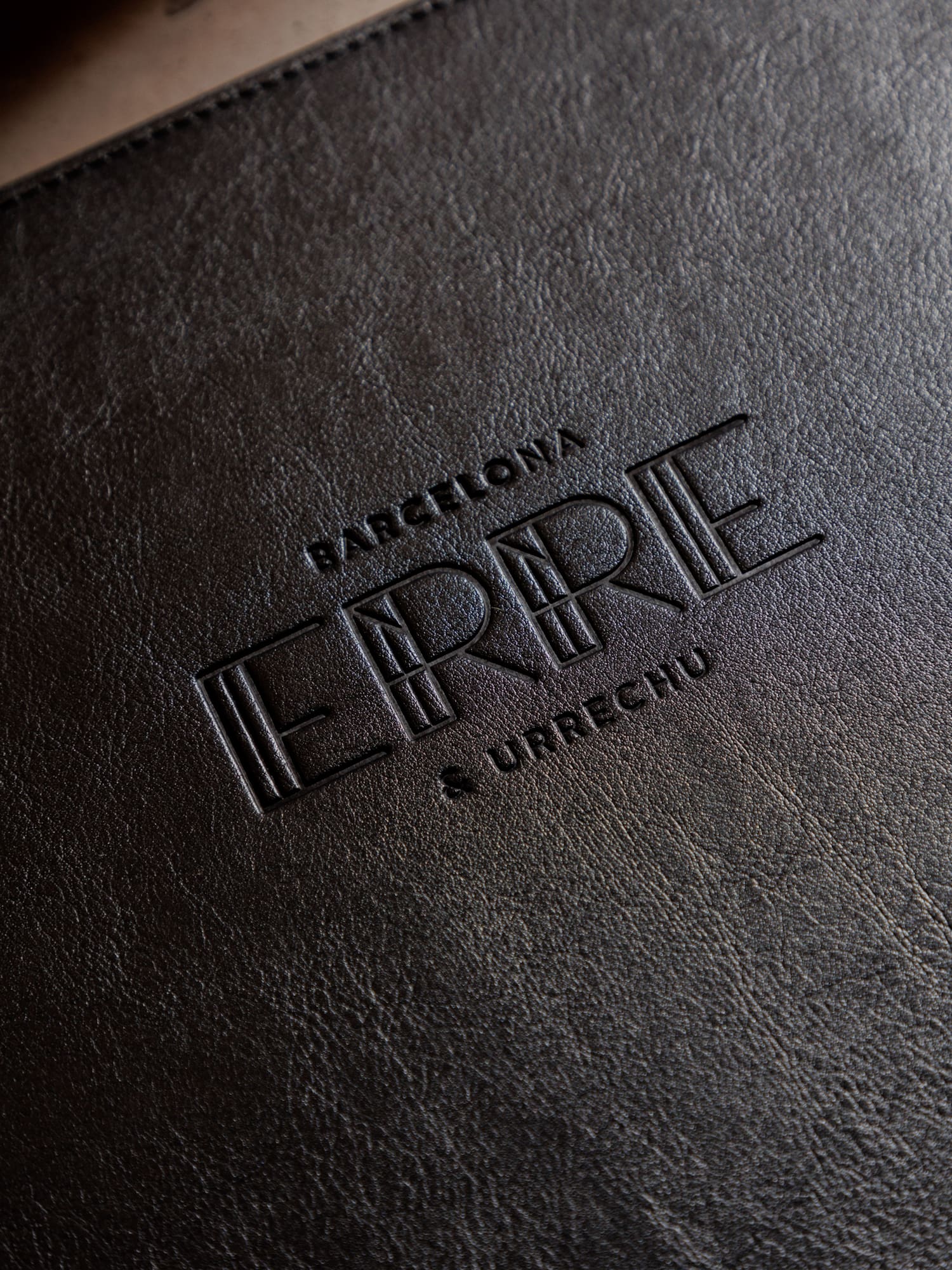 a black leather cover with text